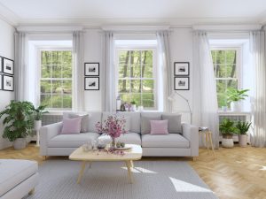 Spacious living room with white walls and large windows